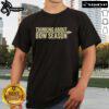 Official Thinking About Bow Season T-Shirt featuring a stylish design for hunting enthusiasts and bow season lovers.