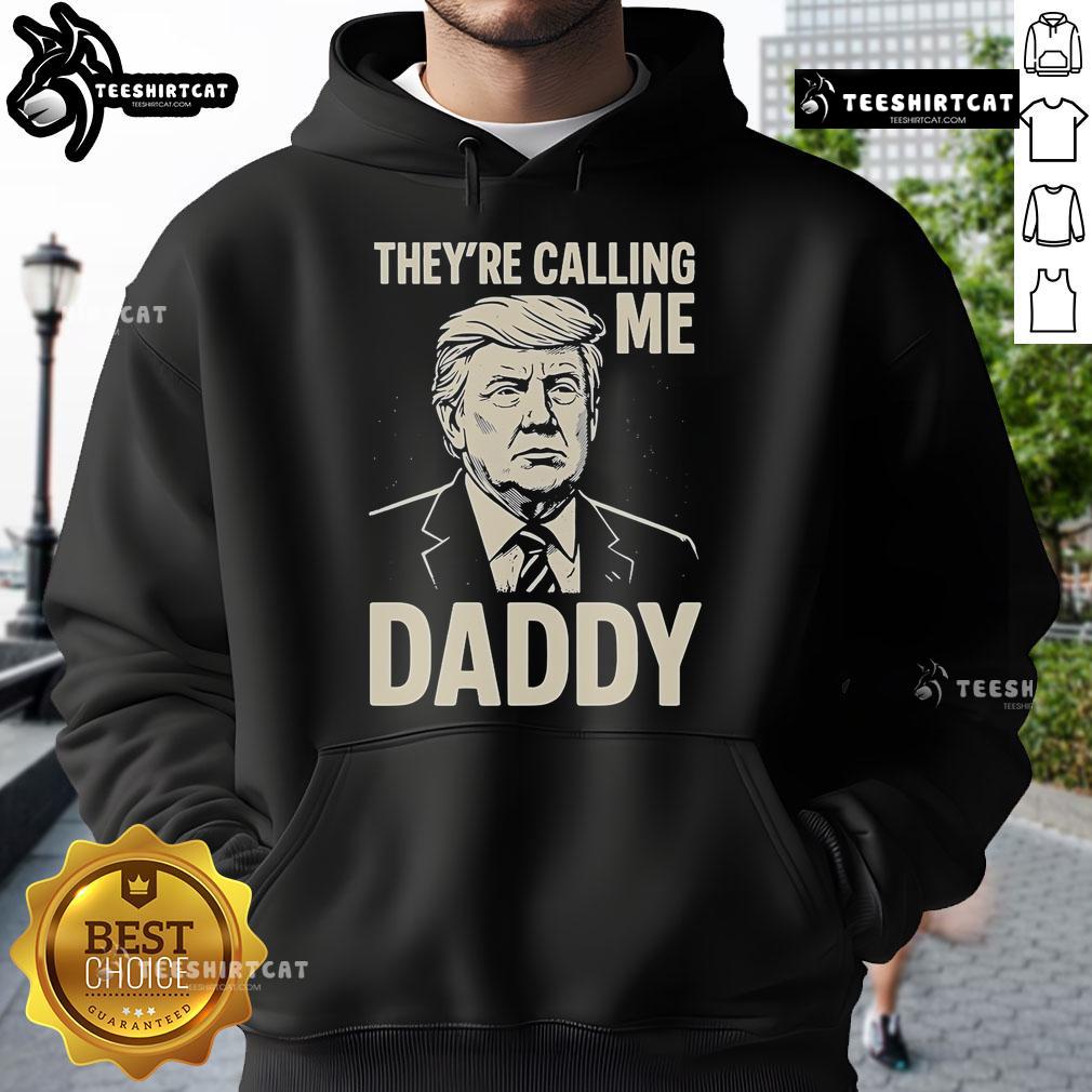 Alt Text: Official Trump 'Theyre Calling Me Daddy' hoodie featuring bold text and a stylish design, perfect for supporters.