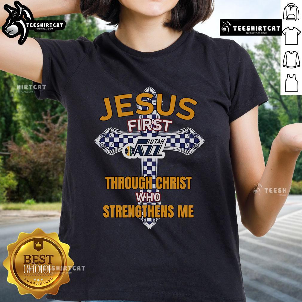 Alt Text: Official Utah Jazz Jesus 'First Through Christ Who Strengthens Me' ladies tee featuring team colors and logo.