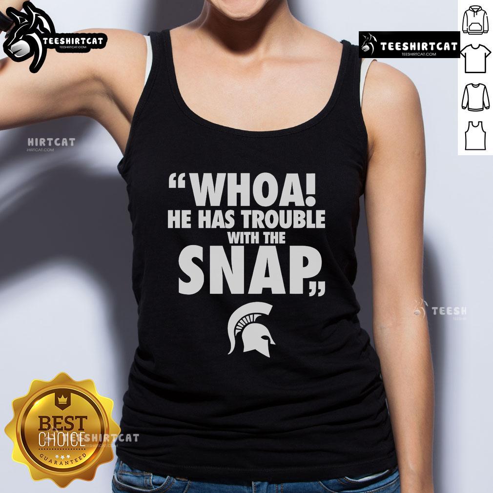 Jalen Watts wearing an official Michigan tank top, showcasing his style and passion for sports in an energetic pose.