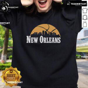Alt Text: Premium New Orleans Pelicans cityscape skyline style 2025 sweatshirt featuring vibrant colors and team logo design.