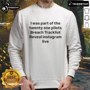 Alt Text: Fan wearing a sweatshirt during Twenty One Pilots Instagram Live tracklist reveal, showcasing the funny moment.