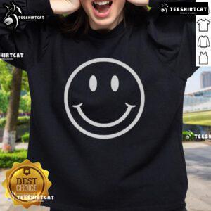 Luke Ellis wearing a Happy The Institute Smiley Face Sweatshirt, showcasing a vibrant and cheerful design.