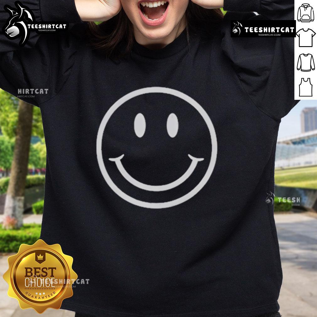 Luke Ellis wearing a Happy The Institute Smiley Face Sweatshirt, showcasing a vibrant and cheerful design.