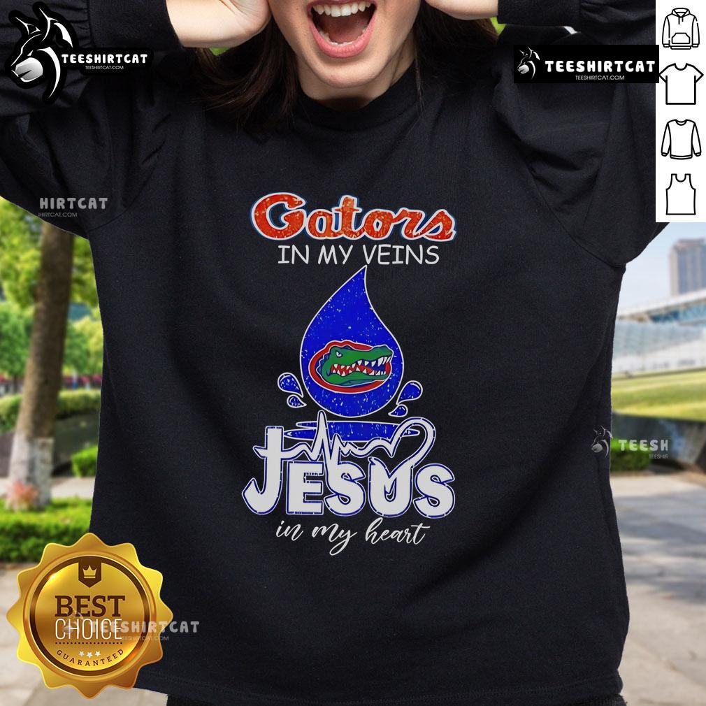 Nice Florida Gators in My Veins Jesus in My Heart sweatshirt featuring vibrant colors and bold lettering.