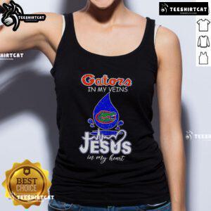 Nice Florida Gators in My Veins Jesus in My Heart tank top showcased on a model, perfect for Gators fans and casual wear.