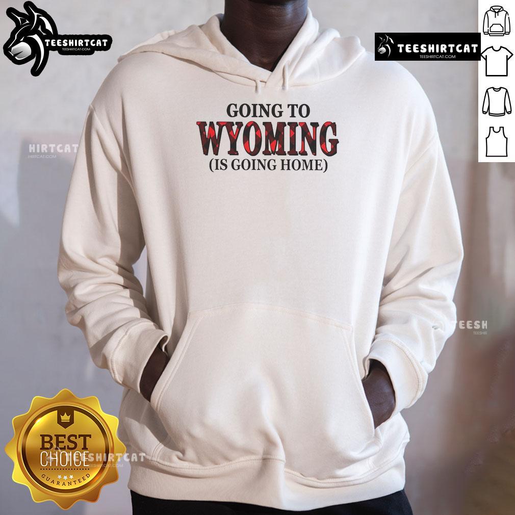 Cozy 'Nice Going To Wyoming Is Going Home' hoodie in a scenic outdoor setting, perfect for Wyoming enthusiasts.