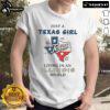 Texas girl living in Illinois world T-shirt design featuring playful typography and vibrant colors, perfect for proud Texans.
