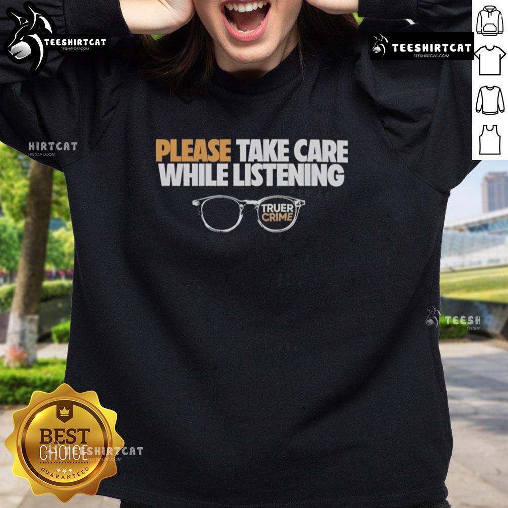 Cozy sweatshirt reading 'Please Take Care While Listening' with glasses, inspired by Nice Tenderfoot TV True Crime.