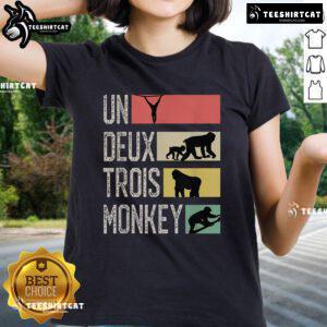 Stylish Nice Un Deux Trois Monkey Ladies Tee featuring playful monkey graphics on a vibrant background.