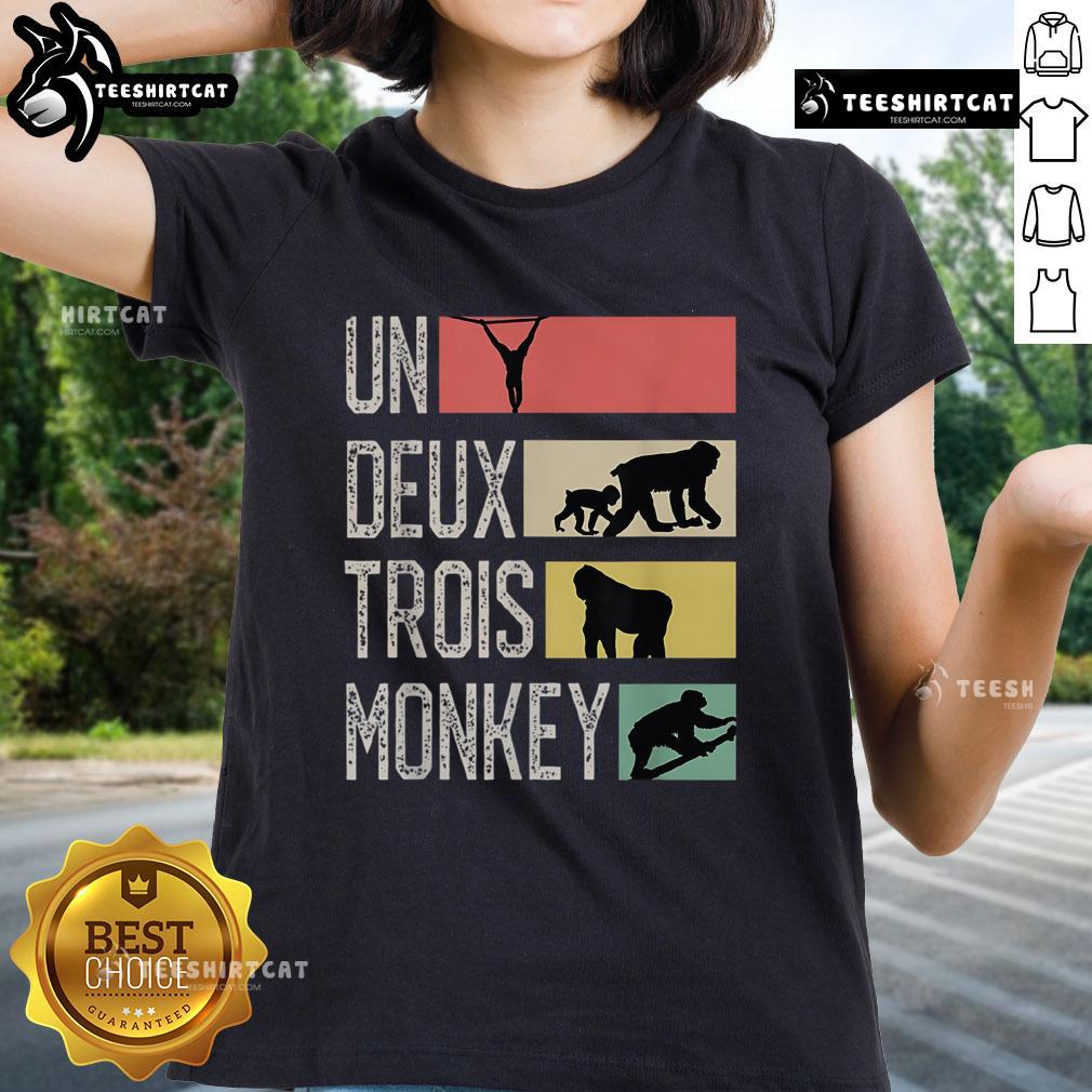 Stylish Nice Un Deux Trois Monkey Ladies Tee featuring playful monkey graphics on a vibrant background.
