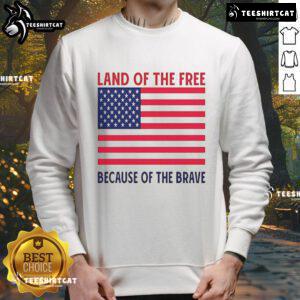 Vivek Ramaswamy wearing a 'Land of the Free Because of the Brave' sweatshirt, showcasing his patriotic style.