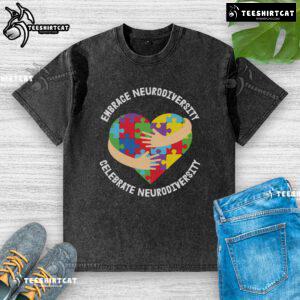 Official Embrace Celebrate Neurodiversity puzzle heart hug design on a washed t-shirt promoting awareness and inclusion.