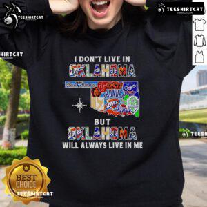 Official 'I Dont Live in Oklahoma but Oklahoma Will Always Live in Me' sweatshirt featuring sport teams logo and design.