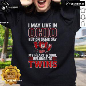 Cozy Minnesota Twins sweatshirt with 'I May Live In Ohio But On Game Day My Heart Belongs To The Twins' slogan.