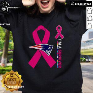 Official New England Patriots Cancer Awareness 'I'm A Survivor' Sweatshirt featuring team logo and supportive message.