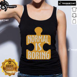 Official Normal is Boring puzzle piece autism awareness tank top in vibrant colors, promoting acceptance and inclusion.