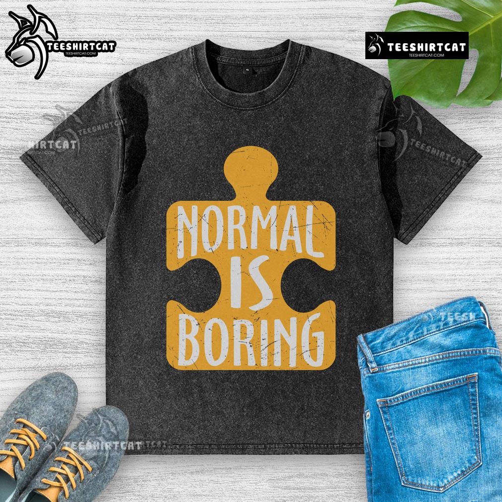 Official Normal is Boring Puzzle Piece Autism Awareness Washed T-Shirt showcasing vibrant design promoting autism acceptance.