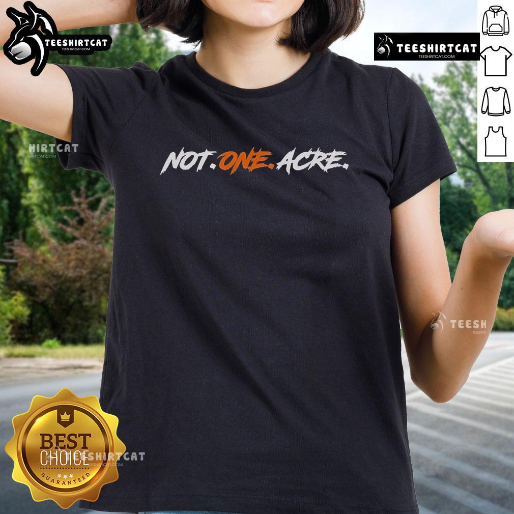 Official Not One Acre Ladies Tee showcasing stylish design and comfortable fit for casual wear.