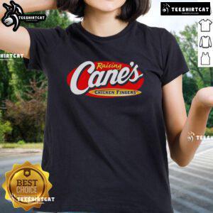 Official Raising Cane's Chicken Fingers ladies tee featuring a stylish design and vibrant colors for fans of the brand.