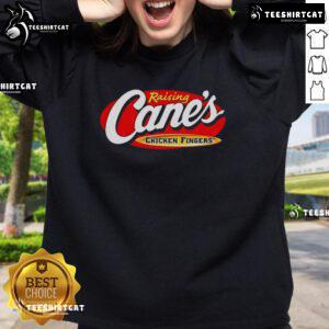 Alt Text: Official Raising Cane's Chicken Fingers sweatshirt featuring logo, stylish design, and cozy fabric for fans.