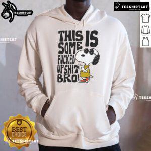 Official Snoopy hoodie featuring 'This Is Some Fucked Up Shit Bro' graphic, perfect for casual wear and Peanuts fans.
