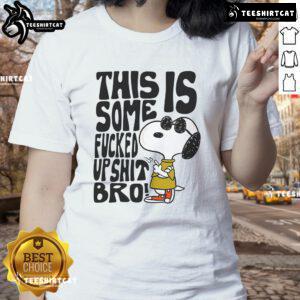 Official Snoopy This Is Some Fucked Up Shit Bro Ladies Tee featuring a humorous Snoopy graphic in vibrant colors.