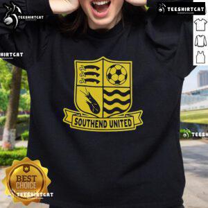 Alt Text: Official Southend United logo sweatshirt featuring a bold design and club colors, perfect for fans and casual wear.