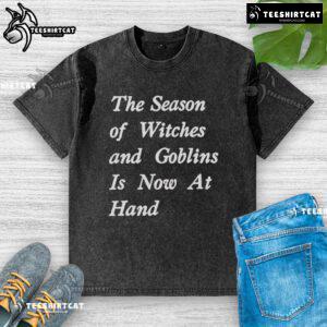 Official Season of Witches and Goblins hand-washed t-shirt featuring spooky designs for Halloween enthusiasts.