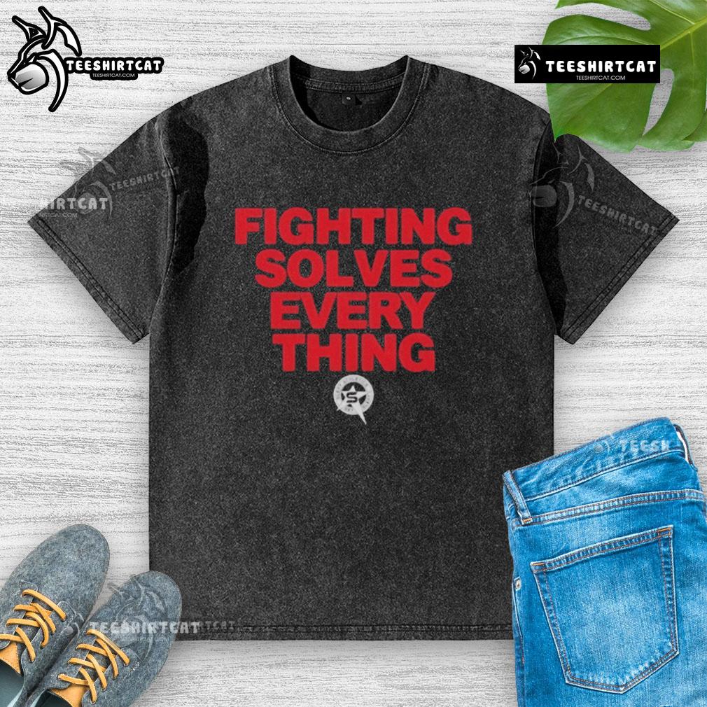 Alt Text: Official Tim Sylvia Fighting Solves Everything washed t-shirt featuring bold graphic design and comfortable fit.
