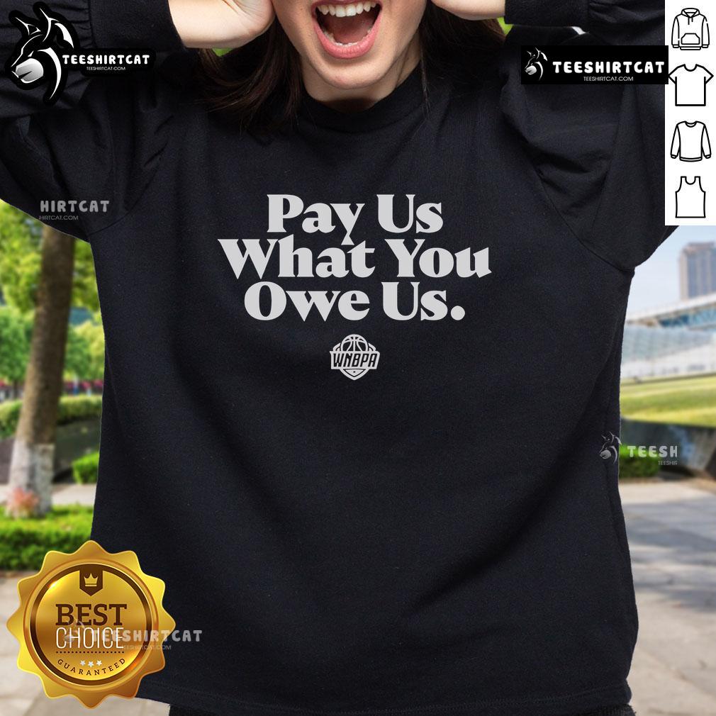 Alt Text: Official WNBPA Pay Us What You Owe Us sweatshirt featuring bold lettering and a stylish design for fans and supporters.