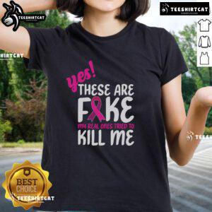 Official Breast Cancer Awareness ladies tee with 'Yes, these are fake. My real one tried to kill me' slogan.