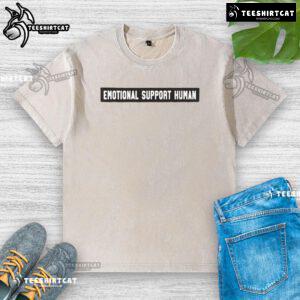 Original Emotional Support Human patch on a washed T-shirt, showcasing a unique design for comfort and style.