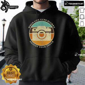 Vintage camera quote hoodie: 'When life gets blurry, adjust your focus' in stylish design for photography lovers.