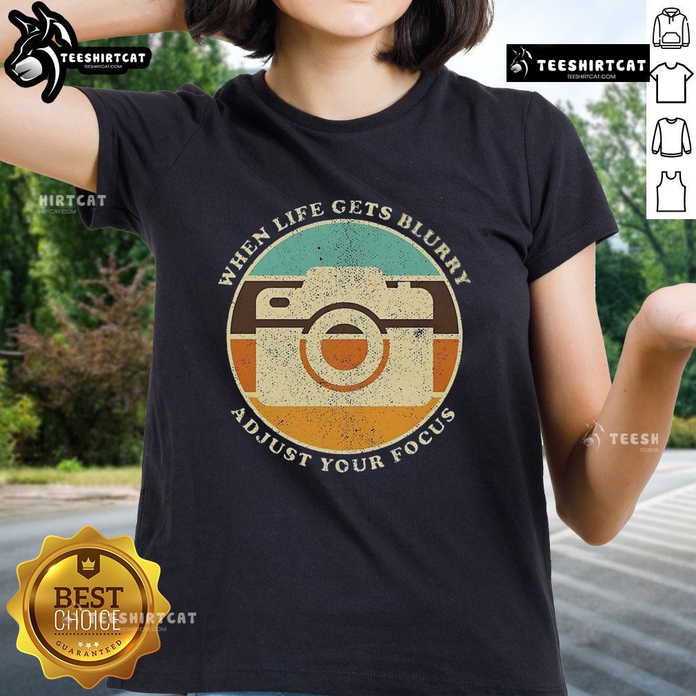 Alt Text: Vintage camera graphic on a ladies' tee with the quote When life gets blurry, adjust your focus.