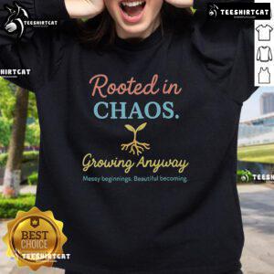 Alt Text: Premium sweatshirt featuring 'Rooted in Chaos, Growing Anyway' design, showcasing messy beginnings and beautiful becoming.