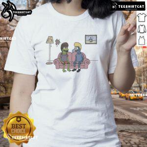 Cute cartoon frog design on a ladies tee, featuring vibrant colors and a playful style for a trendy look.