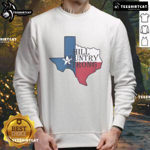Top Brett Lee Hill Country Strong Sweatshirt in a casual setting, showcasing its stylish design and vibrant colors.