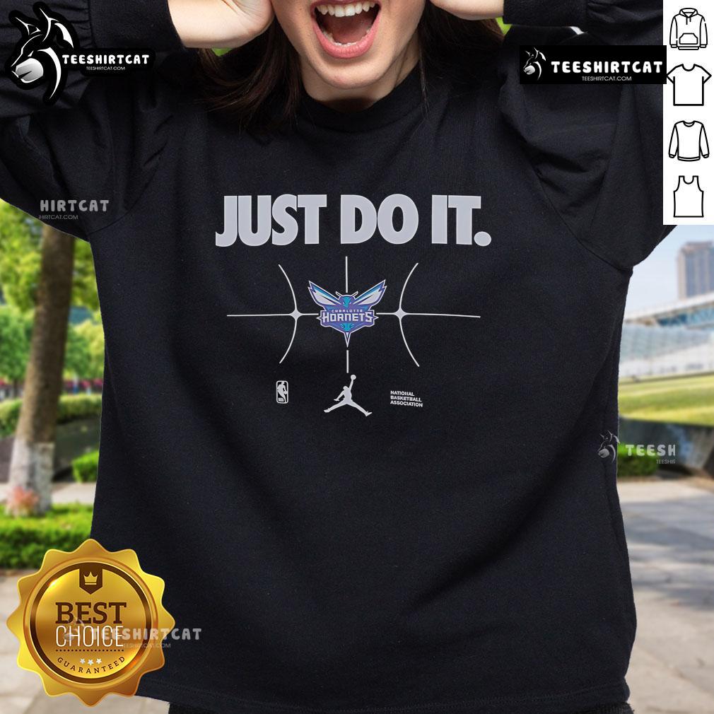 Charlotte Hornets sweatshirt featuring 'Just Do It' design, perfect for fans and casual wear. Stylish and comfortable.