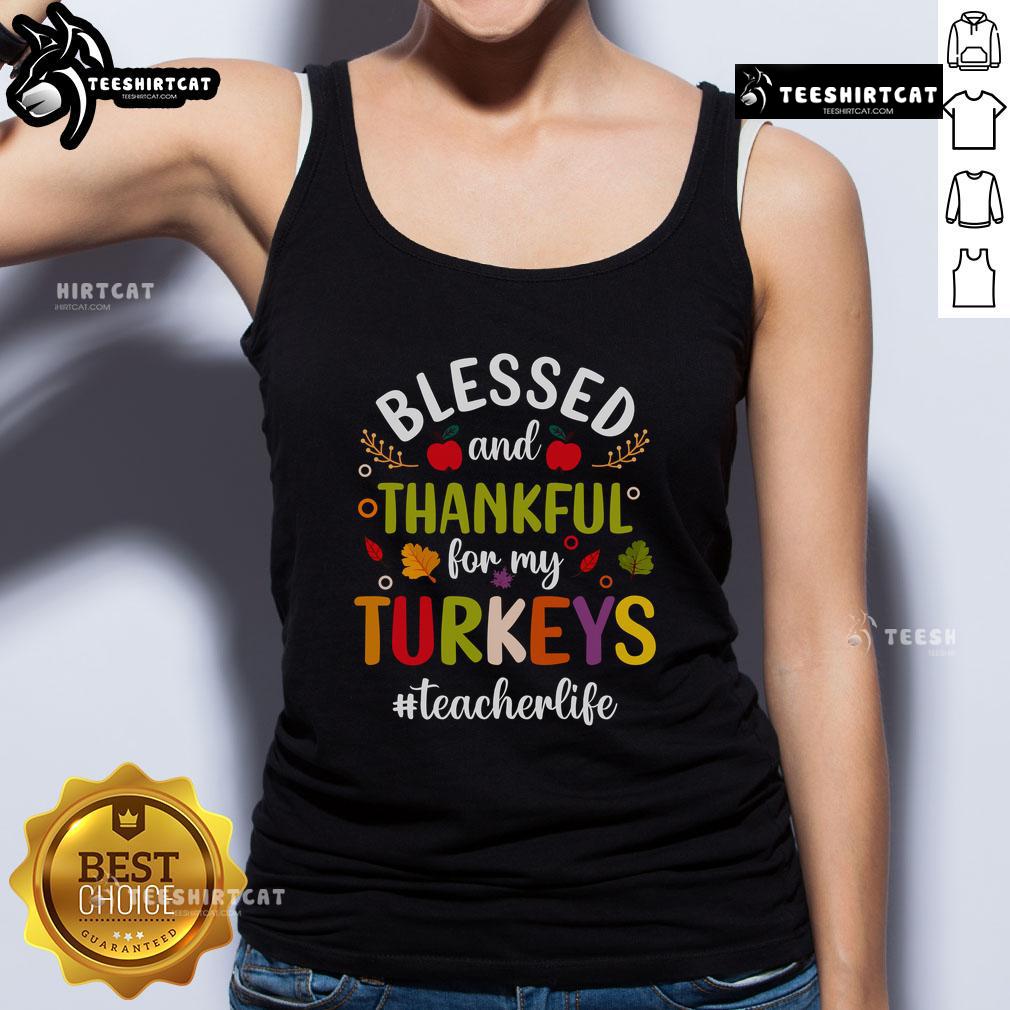 Woman wearing a 'Blessed And Thankful For My Turkeys' tank top, showcasing gratitude and Thanksgiving spirit.