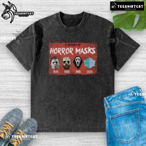 Funny history of horror mask graphic on a washed t-shirt, perfect for horror movie fans and casual wear.