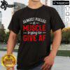 Funny moment of a person almost pulling a muscle while trying to show off an AF T-shirt in a playful pose.
