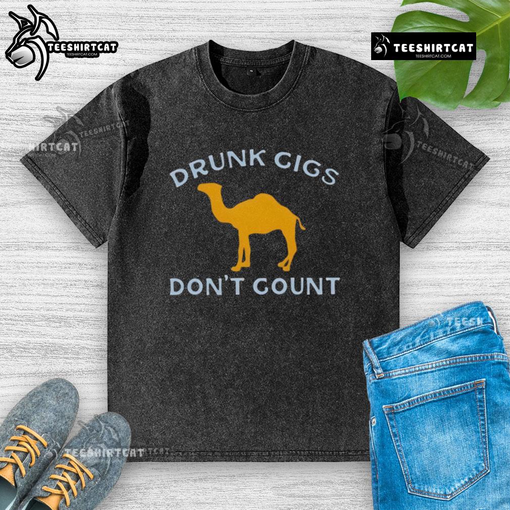 Funny camel graphic on a washed t-shirt, humorously stating 'Cigs Don't Count,' perfect for casual wear.