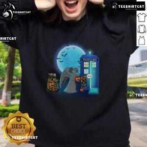 Alt Text: Funny Doctor Who Halloween sweatshirt featuring TARDIS, Dalek, and Weeping Angel for trick or treat fun.
