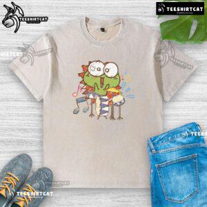 Cute washed t-shirt featuring a funny frog playing a drum, perfect for animal lovers and music enthusiasts.