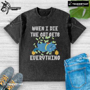 Funny 'When I Die, The Cat Gets Everything' cute washed T-shirt design featuring a playful cat illustration.