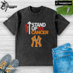 Alt Text: Hot Stand Up To Cancer New York Yankees washed t-shirt featuring bold graphics and soft fabric for a casual look.