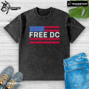 Alt Text: Stylish Hot Washington Free DC washed t-shirt displayed on a wooden surface, perfect for casual wear and local pride.
