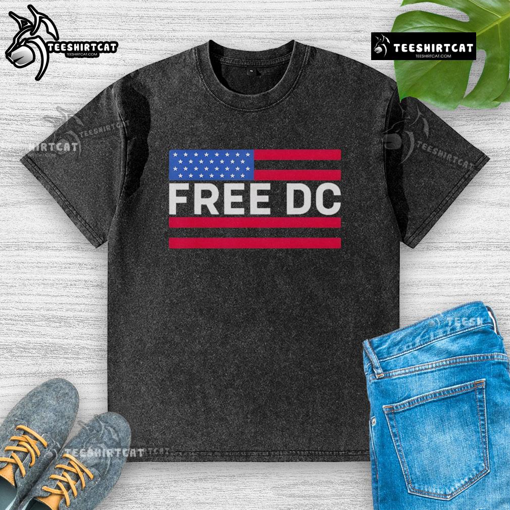 Alt Text: Stylish Hot Washington Free DC washed t-shirt displayed on a wooden surface, perfect for casual wear and local pride.