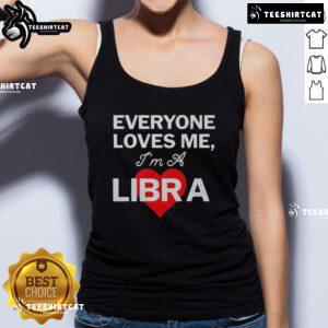 Nice Carhartt WIP 'Everyone Loves Me, I'm a Libra' tank top displayed on a hanger, perfect for astrology lovers.